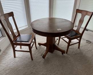 Unusual smaller size Oak Round table and 2 chairs