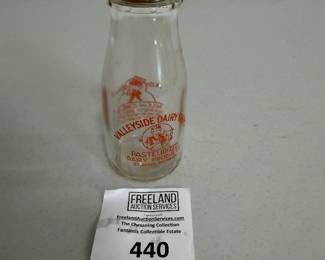 Dozens of antique Michigan milk bottles OWOSSO