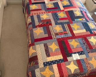 Several antique quilts