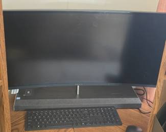 HP Envy curved monitor with Bang & Olufsen (B&O) soundbar base