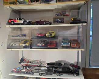 Collectible die cast cars in acrylic boxes