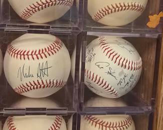 Signed Baseballs - some of the signatures are:  Don Sutton, Bobby Thomson, Michey Lolich, Pee Wee Reese, Gary Cooper, Ralph Kiner