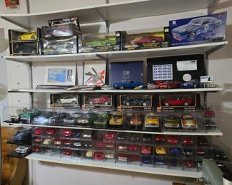 Collectible die cast cars in acrylic boxes