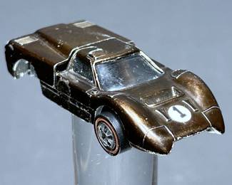 An original 1968 Hot Wheels Redline Ford J in brown