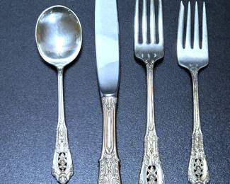 STERLING SILVER FLATWARE BY WALLACE IN THE ROSEPOINT PATTERN