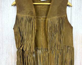 Vintage late 1960s leather suede fringe vest from Tredo's Westernware, Woodwarn, Oklahoma