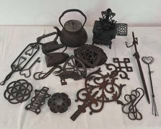 Assortment of Vintage and Antique Cast Iron Kitchenware and Decorative Items