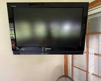 Wall-mounted flat-screen television