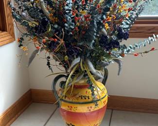 Large decorative vase and floral arrangement