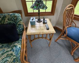 Rattan side table with decorative lamp