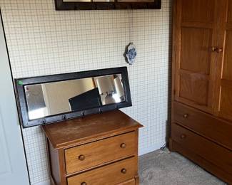 Mirrors with coat hooks