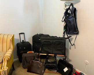 Luggage of all sizes AND luggage rack