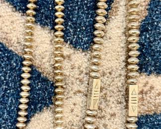 Left - Unsigned Native American Bench Crafted Sterling Necklace and Right - Navajo Floyd Laners Sterling Necklace