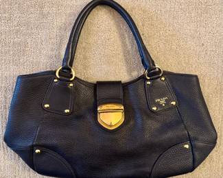 Boy do we have bags! Hundreds! This here is a Prada Bag