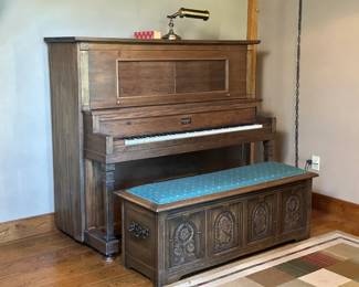 Player piano with apx. 100 music rolls. Vintage Ethan Allen Knights Chest from their Old World Collection.