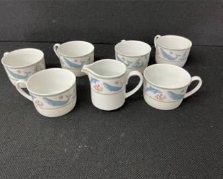 whale and ship cups