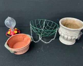 Planters and hummingbird feeder