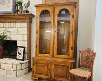 Gun Cabinet and antique chair