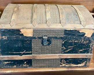 ANTIQUE CAMELBACK STEAMER TRUNK