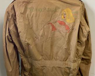  original, authentic World War II U.S. Army M1941 field jacket with custom "nose art" style trench art, featuring a hand-painted pin-up girl titled "Slave Girl"