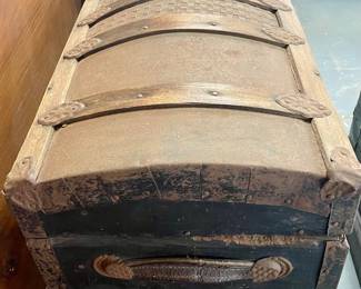 ANTIQUE CAMELBACK STEAMER TRUNK