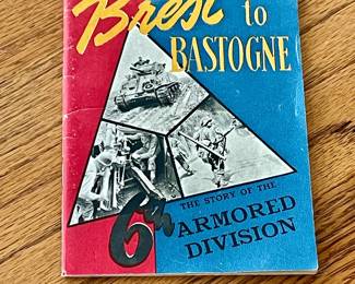 World War II pocket-size booklet titled "Brest to Bastogne: The Story of the 6th Armored Division".