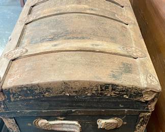 ANTIQUE CAMELBACK STEAMER TRUNK