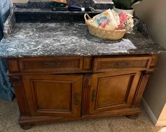 Antique cabinet with marble top
