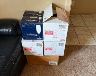 Boxes of champagne glasses great for a wedding