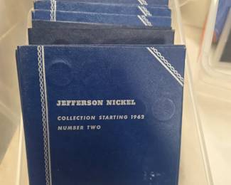 Coin books with coins.
