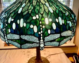 American made.Tiffany style Dragonfly 24”diameter stained Glass with a Tree Trunk Base.