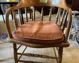 Sitting Chair with orange cushion