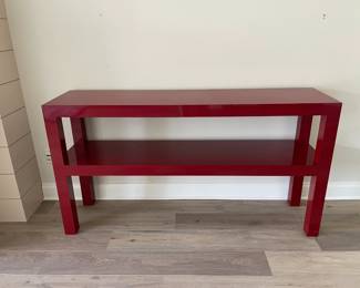red parsons console table