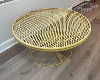 yellow metal outdoor coffee table