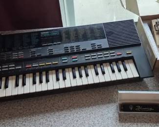 Yamaha Portasound PSS480 Keyboard with Kalimbas  Harmonica
