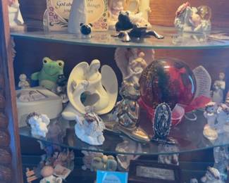 Lots of angels. A few Seraphin figures , Dreamsicles and other Knick knacks
