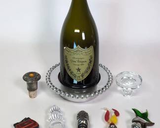 Empty 1999 Don Perignon Bottle With Stoppers.