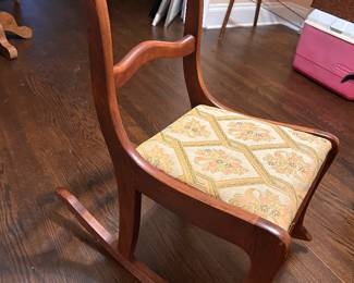 Tell City vintage small rocker, carved mahogany with original material