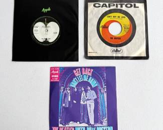 27 TheBeatles7InchVinylSinglesTrio