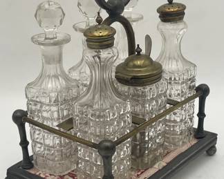 6 Bottle Glass Caster Set in Silverplate Tile Base Holder