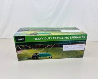 NEW In Box Orbit Traveling Lawn Sprinkler Tractor