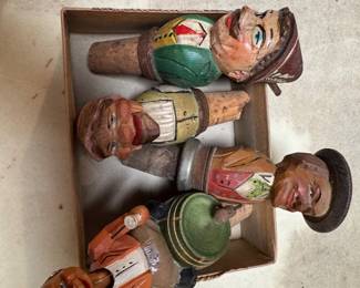 Curved wood figure bottle tappers
