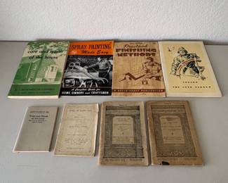 v Assortment of Books Featuring Home Improvement and Maritime Themes