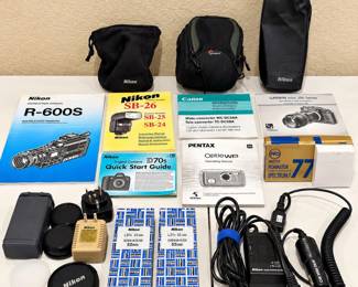 e Assorted Nikon Camera Accessories Lot with Cases, Cords, Lenses, Manuals, and More