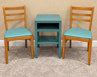 f Two Wooden Chairs with Blue Cushions and Blue Side Table