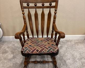 f Vintage Wooden Rocking Chair with Decorative Backrest and Cushioned Seat