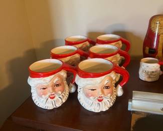 Vintage winking Santa mugs 