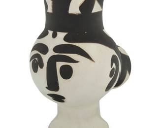 2197 Pablo Picasso (1881-1973) "Chouette femme," conceived 1951 White earthenware vase with black engobe and white glaze From the edition of 500 Painted on the underside: EDITION / PICASSO / MADOURA; impressed: MADOURA / PLEIN FEU / EDITION PICASSO Height 11 1/4 in., width 8 3/4 in., depth 6 in. Estimate: $4,000 - $6,000