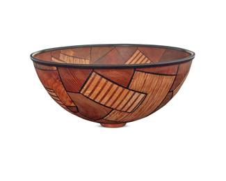 2210 Gianfranco Angelino (1938-2010) A patchwork wood bowl, 1990s Pine, yew, Tree of Heaven, larch root, and epoxy resin Signed to underside: G. Angelino Height 5 1/2 in., diameter 11 3/4 in. Estimate: $800 - $1,200