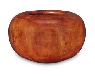 2208 Edward Moulthrop (1916-2003) A turned cherry wood bowl, mid/late 20th century Incised signature and inscription to underside: MOULTHROP / WILD CHERRY; stamped with artist's device Together with signed hardcover book: Wallace, Kevin. "Moulthrop: A Legacy in Wood." Louisville, KY: Crescent Hill Books, 2007 Signed First Printing Signed by Philip and Matt Moulthrop, with gift inscription Height of bowl 6 in., diameter 10 in.; height of book 12 3/8 in., width 9 3/4 in., depth 7/8 in. Estimate: $2,000 - $3,000